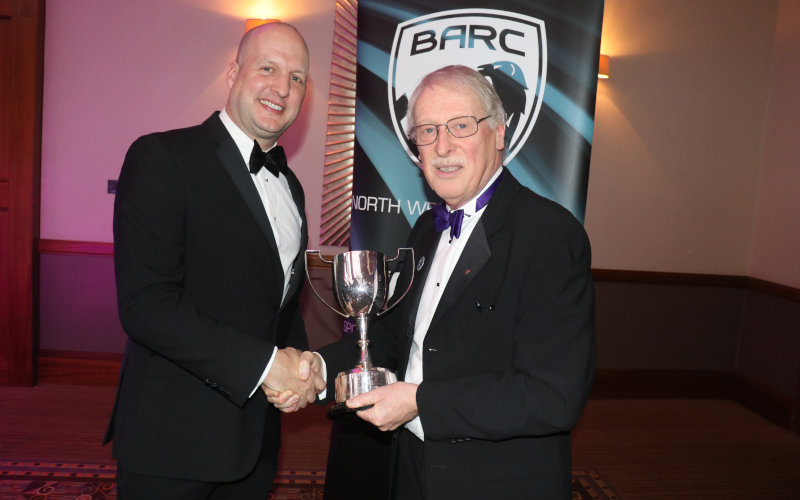 John Leck is presented with the Jock Sinclair trophy by BARC NW Chair Ian Buckley